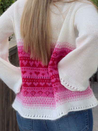 Hjertevarm – Oversized genser med feminine detaljer