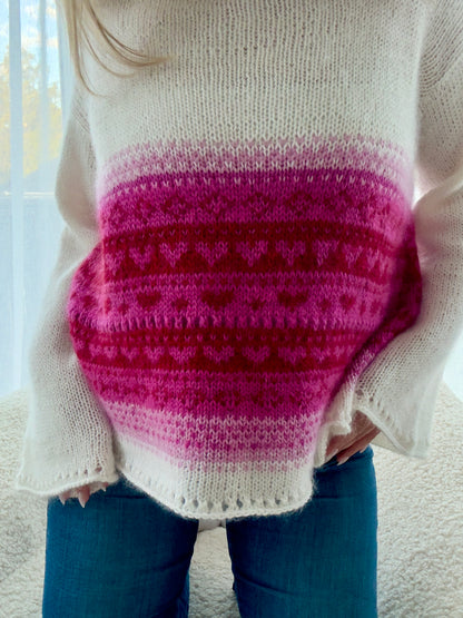 Hjertevarm – Oversized genser med feminine detaljer