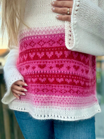 Hjertevarm – Oversized genser med feminine detaljer